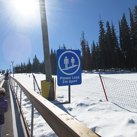 L506 Please Load (Provide Distance) Apart - with Conveyor Symbol 18" x 24" Blue Reflective Aluminum lift sign for ski areas - produced by Inter-Mtn.. Click to expand image