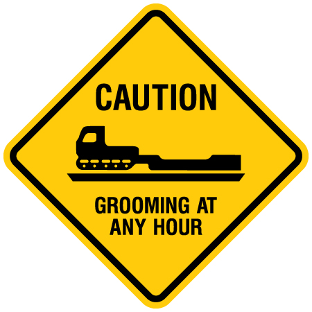 caution grooming at any hour sign for snowmobile clubs by Inter-Mtn.