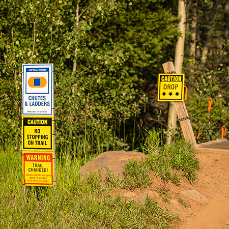 Warning Trail Changed, jumps and berms have been re-worked, gauge speed accordingly, Mountain bike risk and liability, safety, summer, trail, downhill, available on white or yellow coroplast and 12 gauge sign grade aluminum sheeted with top quality, high performance print* or vinyl graphics.. Click to expand image