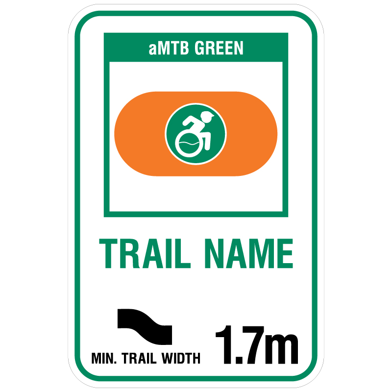 aMTB Green - Beginner features and moderate terrain. Signage for adaptive mountain biking freeride trails shows trail designation surrounded by an orange pill. The aMTB symbol indicates accessibility for adaptive bikes/riders on adaptive bike-friendly aMTB trails on trail networks.. Click to expand image