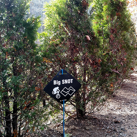 E103, 11.5 x 11.5, mountain bike trail name cross-country, double black diamond polythylene disc, UV protected and cost effective marking signs, holes on top to hang from rope, slots top and bottom to fit over bamboo poles, trail and ability markers.. Click to expand image