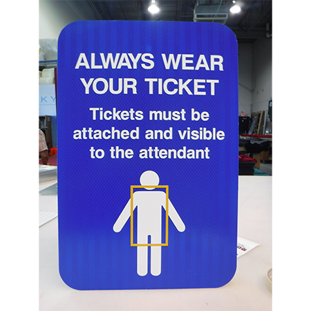 L114 Always Wear Your Ticket so it is Visible to Attendant and in the Strike Zone 18" x 24" Blue Reflective Aluminum sign for ski areas - produced by Inter-Mtn.. Click to expand image