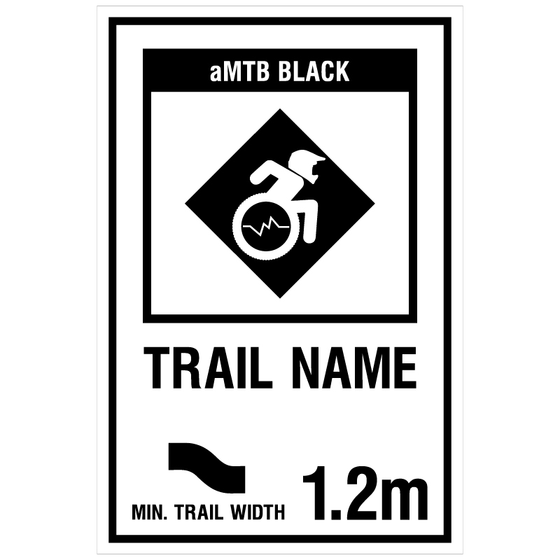 aMTB Black - Advanced obstacles exist, some trail obstructions. Signage for adaptive mountain biking technical trails shows trail designation. The aMTB symbol indicates accessibility for adaptive bikes/riders on adaptive bike-friendly aMTB trails on trail networks.