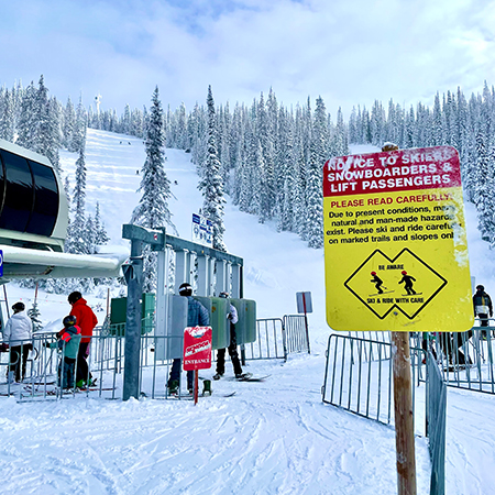 H606 18" x 24" Notice to Skiers, Snowboarders & Lift Passengers, Please Read Carefully, yellow reflective aluminum closure sign with rounded corners - ski area sign - Inter-Mtn.. Click to expand image