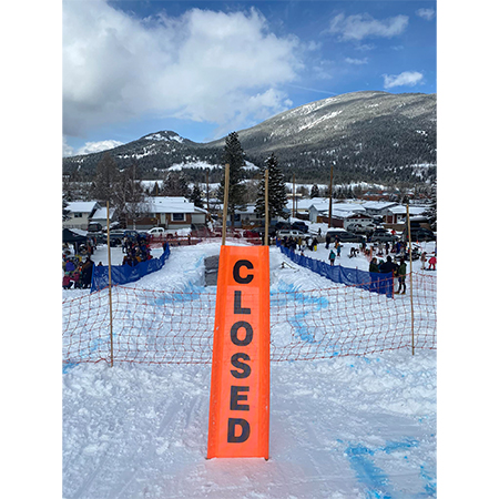BV03 Closed, high visibility orange vertical mesh banner 18x60, high visibility orange mesh banner 84x30, tear and mildew resistant high tenacity polyester, coated with fade resistant high vis orange vinyl, grommets and sleeves on sides for bamboo poles.. Click to expand image