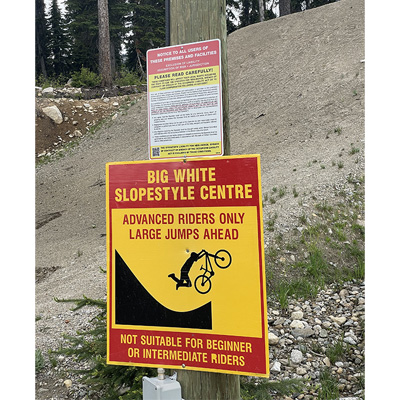 H621 Exclusion of Liability sign in the summer for lift access downhill Mountain Biking. Click to expand image