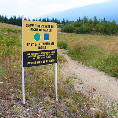 B852 24 x 24, Slow Riders Have The Right Of Way On Easy & Intermediate Trails, coroplast, 12 gauge sign grade aluminum sheeted with top quality prismatic reflective, high performance print or vinyl graphics, important information, liability, you assume the risk of injury, mountain bike, bike park, trail sign.. Click to expand image