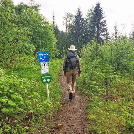 E104, 11.5 x 11.5, trail name with arrow, green circle polythylene disc, UV protected and cost effective marking signs, holes on top to hang from rope, slots top and bottom to fit over bamboo poles, trail and ability markers.. Click to expand image
