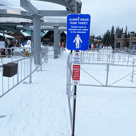 L114 L108 Always Wear Your Ticket so it is Visible to Attendant and in the Strike Zone, No Smoking No Vaping 18" x 24" Blue Reflective Aluminum sign for ski areas - produced by Inter-Mtn.. Click to expand image