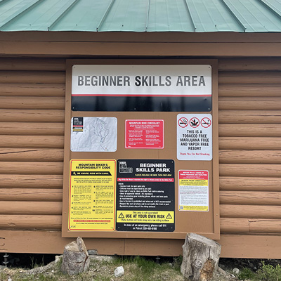 H621 Exclusion of Liability Sign at Big White with other Risk Management signs by Inter-Mtn.. Click to expand image