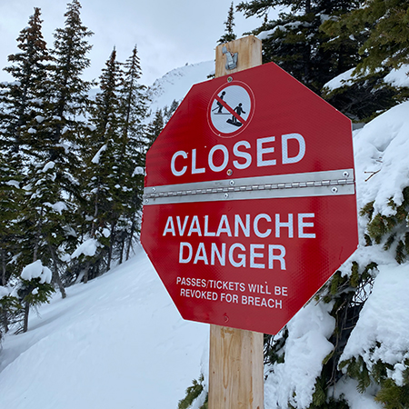 H316 Closed/Caution Avalanche Danger - Flip Sign, yellow and red reflective aluminum octagon closure sign - ski area sign - Inter-Mtn.. Click to expand image