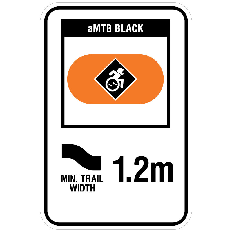 aMTB Black - Advanced obstacles exist, some trail obstructions. Signage for adaptive mountain biking freeride trails shows trail designation surrounded by an orange pill. The aMTB symbol indicates accessibility for adaptive bikes/riders on adaptive bike-friendly aMTB trails on trail networks.. Click to expand image