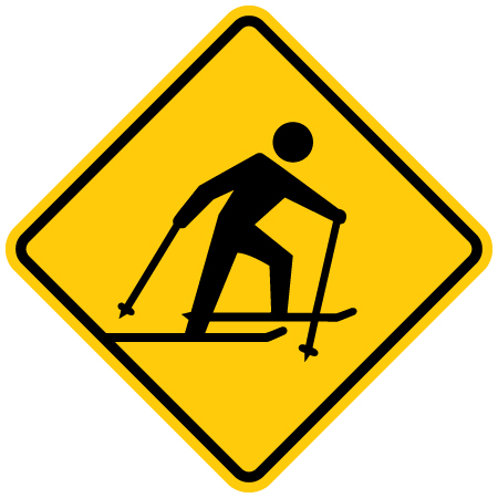 Nordic skier symbol on yellow vinyl on aluminum