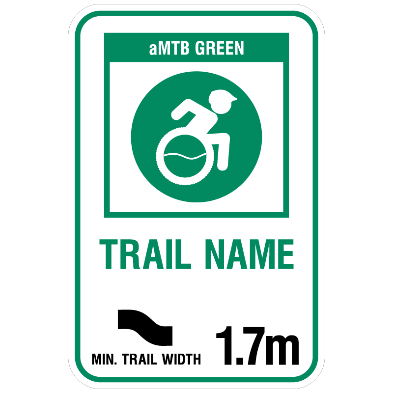 aMTB Green - Beginner features and moderate terrain. Signage for adaptive mountain biking technical trails shows trail designation. The aMTB symbol indicates accessibility for adaptive bikes/riders on adaptive bike-friendly aMTB trails on trail networks.. Click to expand image