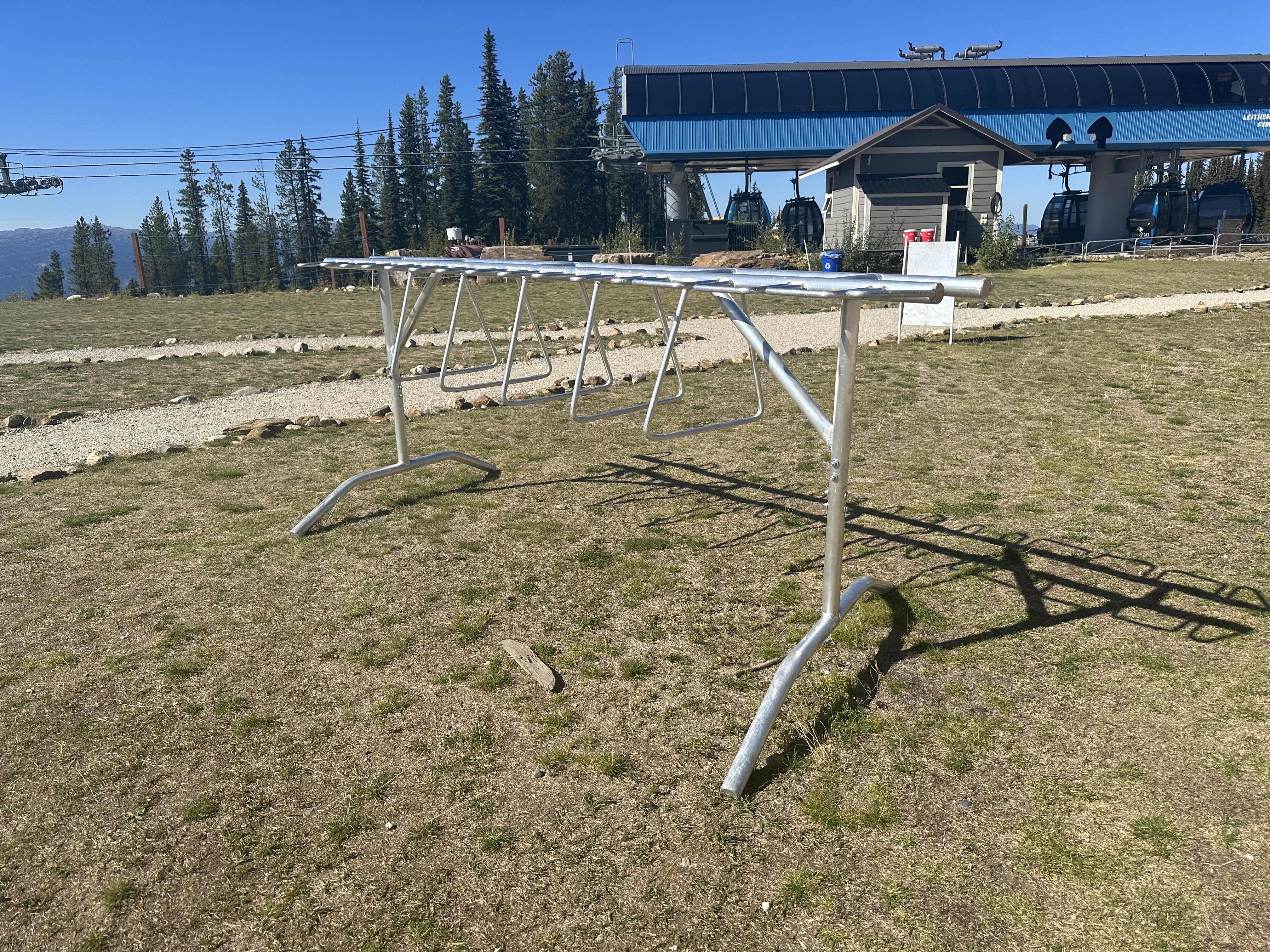 Add multiseasonal use to Inter-Mtn.'s standard ski rack with a simple addition to include bikes
Inter-Mtn.’s 10’ standard aluminum ski rack with removable legs was designed to hold a combination of up to 30 pairs of skis/snowboards and 4 adult-sized bikes. Click to expand image