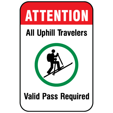 H230 Attention - All Uphill Travelers Valid Pass Required with Uphill Skier Symbol 12" x 18" White Reflective Aluminum Sign produced by Inter-Mtn.. Click to expand image