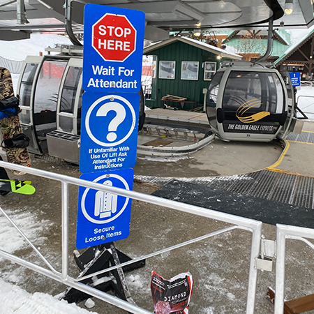 L216 Stop Here Wait for Attendant 18" x 24" Blue Reflective Aluminum lift sign for ski areas - produced by Inter-Mtn.. Click to expand image