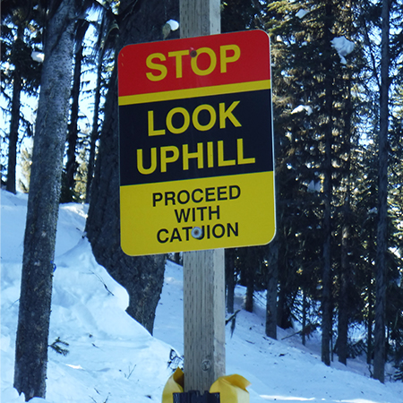 H212 Stop - Look Uphill Proceed With Caution 18" x 24" Yellow Reflective Aluminum Sign produced by Inter-Mtn.. Click to expand image
