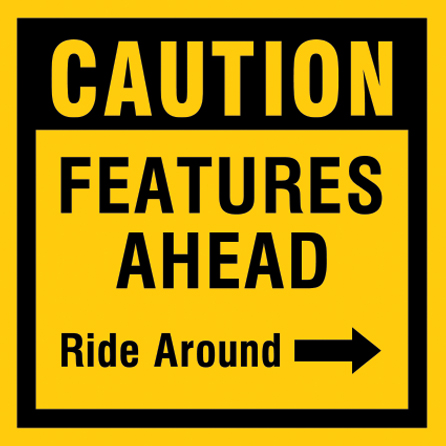 Mountain bike risk and liability signage: caution features ahead