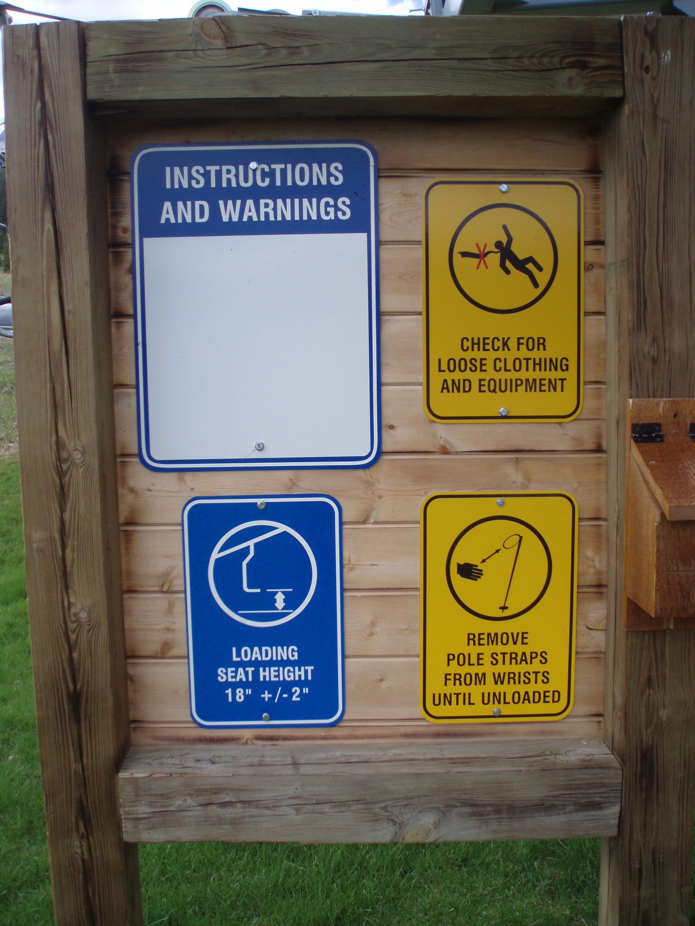 A collection of Inter-Mtn.'s aluminum ANSI Signs reflective and dry erase signs at a ski area. Click to expand image