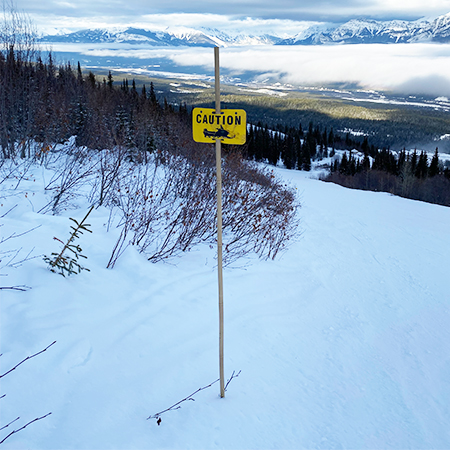 D03 Caution Snowmobile - 11.5" x 7" Yellow rectangle polythylene disc, UV protected and cost effective marking signs, holes on top to hang from rope, slots top and bottom to fit over bamboo poles, trail and ability markers.. Click to expand image