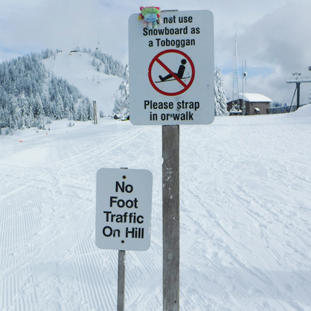 H116 H130 Do Not Use Snowboard as a Toboggan Please strap in or walk, No Foot Traffic On Hill, 18" x 24" White Reflective Aluminum Sign produced by Inter-Mtn.. Click to expand image