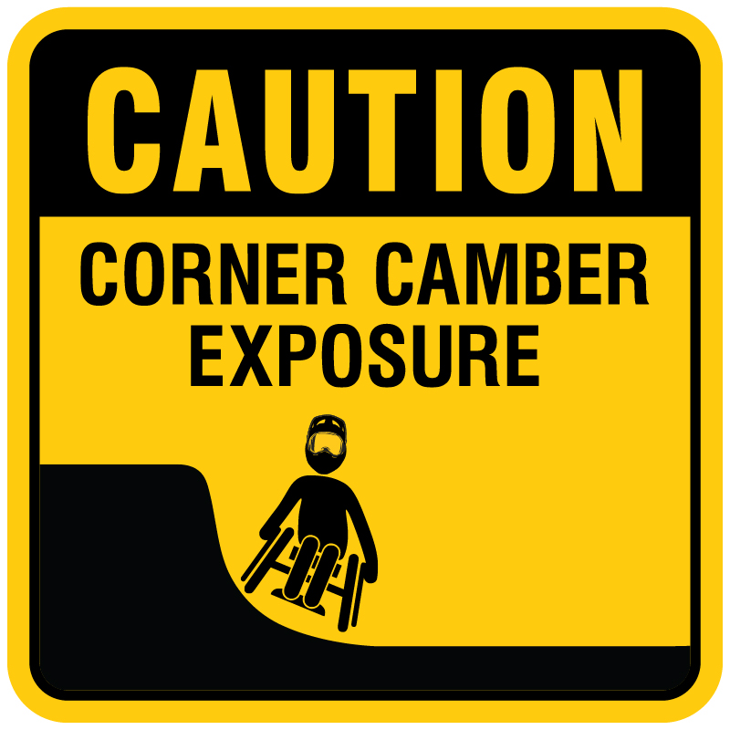 Caution corner camber exposure. Signage for adaptive mountain biking technical trails shows trail designation. The aMTB symbol indicates accessibility for adaptive bikes/riders on adaptive bike-friendly aMTB trails on trail networks.. Click to expand image