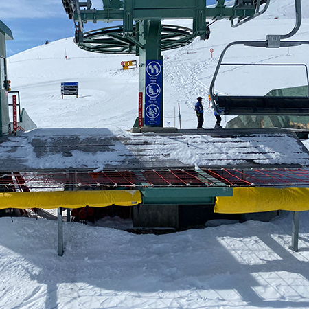 Z05 Keep Tips Up, Z06 Raise Restraining Device, Z15 Unload Here - Two Left Arrows. 18" x 24" blue reflective aluminum CSA - Z98 sign with rounded corners - ski area sign - Inter-Mtn.. Click to expand image