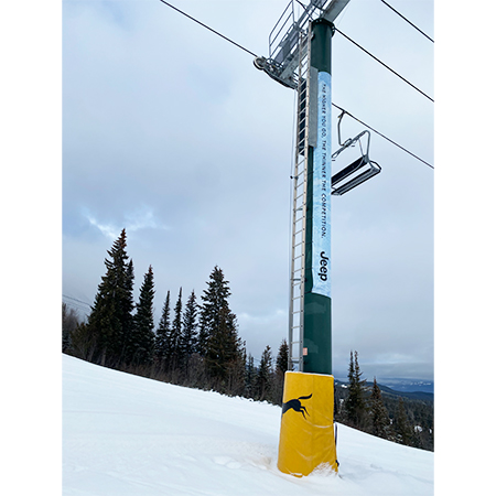 Tower wrap vinyl banner with Jeep branding at Kicking Horse Mountain Resort.