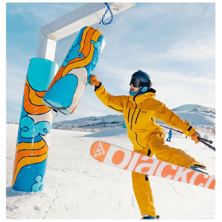 Skier punches a punching bag made for Sun Valley Resort. Punching Bag - Full Colour 18oz Vinyl Pad Set for Punching Bag Structure. This is custom-made for Sunny's Adventure Park at Sun Valley Resort