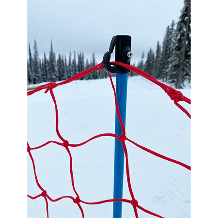 Red blue pop fence with pole hook on snow.. Click to expand image