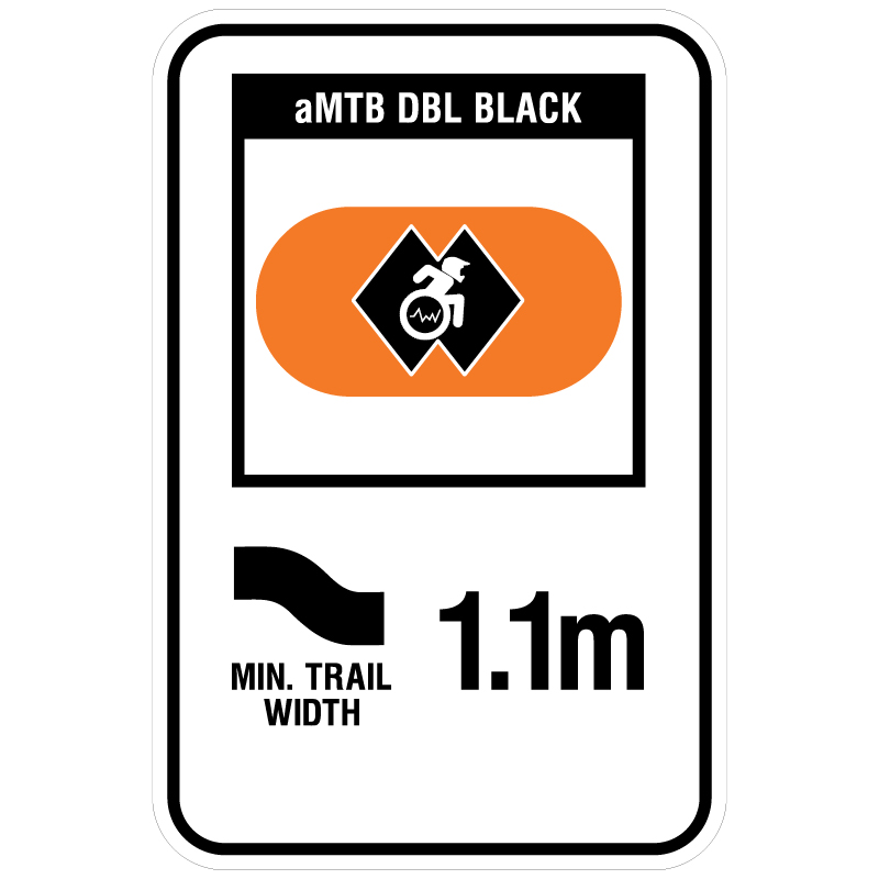 aMTB DBL Black - Expert trail features not suitable for some adaptive equipment. Signage for adaptive mountain biking freeride trails shows trail designation surrounded by an orange pill. The aMTB symbol indicates accessibility for adaptive bikes/riders on adaptive bike-friendly aMTB trails on trail networks.. Click to expand image