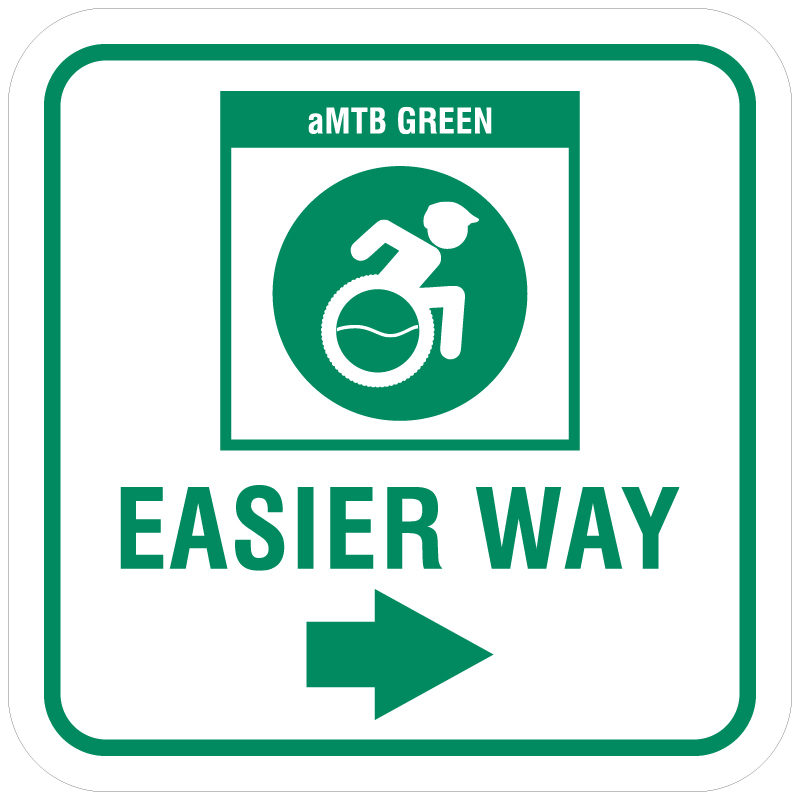 aMTB Green - Beginner features and moderate terrain. Signage for adaptive mountain biking technical trails shows trail designation. The aMTB symbol indicates accessibility for adaptive bikes/riders on adaptive bike-friendly aMTB trails on trail networks.. Click to expand image