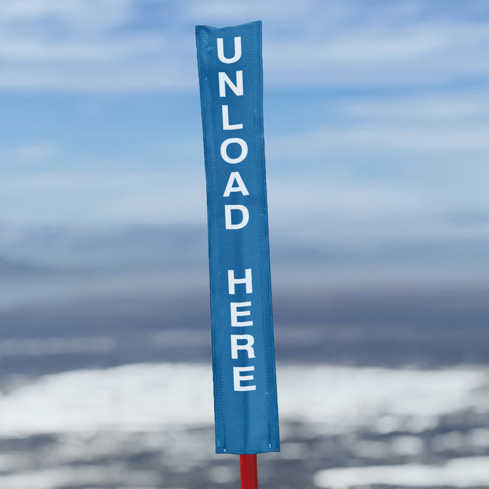 18oz vinyl banner material with a digital print - Pole Banner for ski resorts that reads Unload Here. Click to expand image