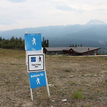 E121, 11.5 x 11.5, hiking graphic, blue square polythylene disc, UV protected and cost effective marking signs, holes on top to hang from rope, slots top and bottom to fit over bamboo poles, trail and ability markers.. Click to expand image