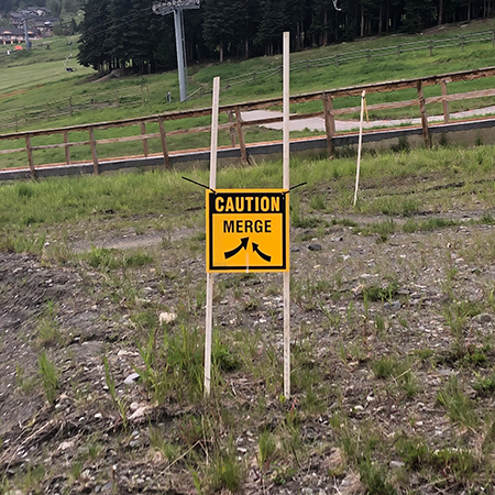 B402, 18 x 18, 12 x 12, caution merge, arrows, Mountain bike risk and liability, safety, summer, trail, downhill, available on white or yellow coroplast and 12 gauge sign grade aluminum sheeted with top quality, high performance print* or vinyl graphics.. Click to expand image