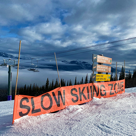 BL11 Slow Skiing Zone - Hi Vis Orange Banner Oversized 21' x 30", tear and mildew resistant high tenacity polyester, coated with fade resistant vinyl, grommets and sleeves on sides for bamboo poles.. Click to expand image