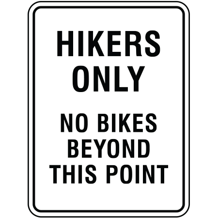 R103 18 x 24, Hikers Only No Bikes Beyond This Point, White Reflective Aluminum Sign, simple message for all parks and recreational facilities. Signs can be easily adapted to BC Parks, Parks Canada, rules and conditions of your specific area, jurisdiction, produced by Inter-Mtn.. Click to expand image