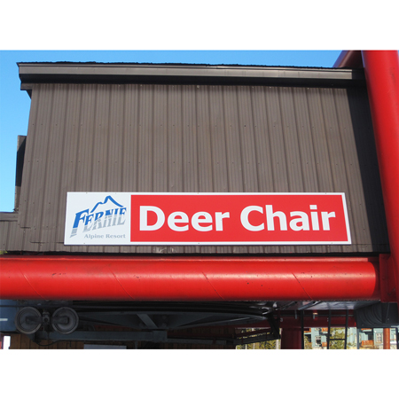 Custom designed signs identify lifts and buildings. Logos provide photo and branding opportunities. Aluminum panels or cut metal letters and logos.. Click to expand image